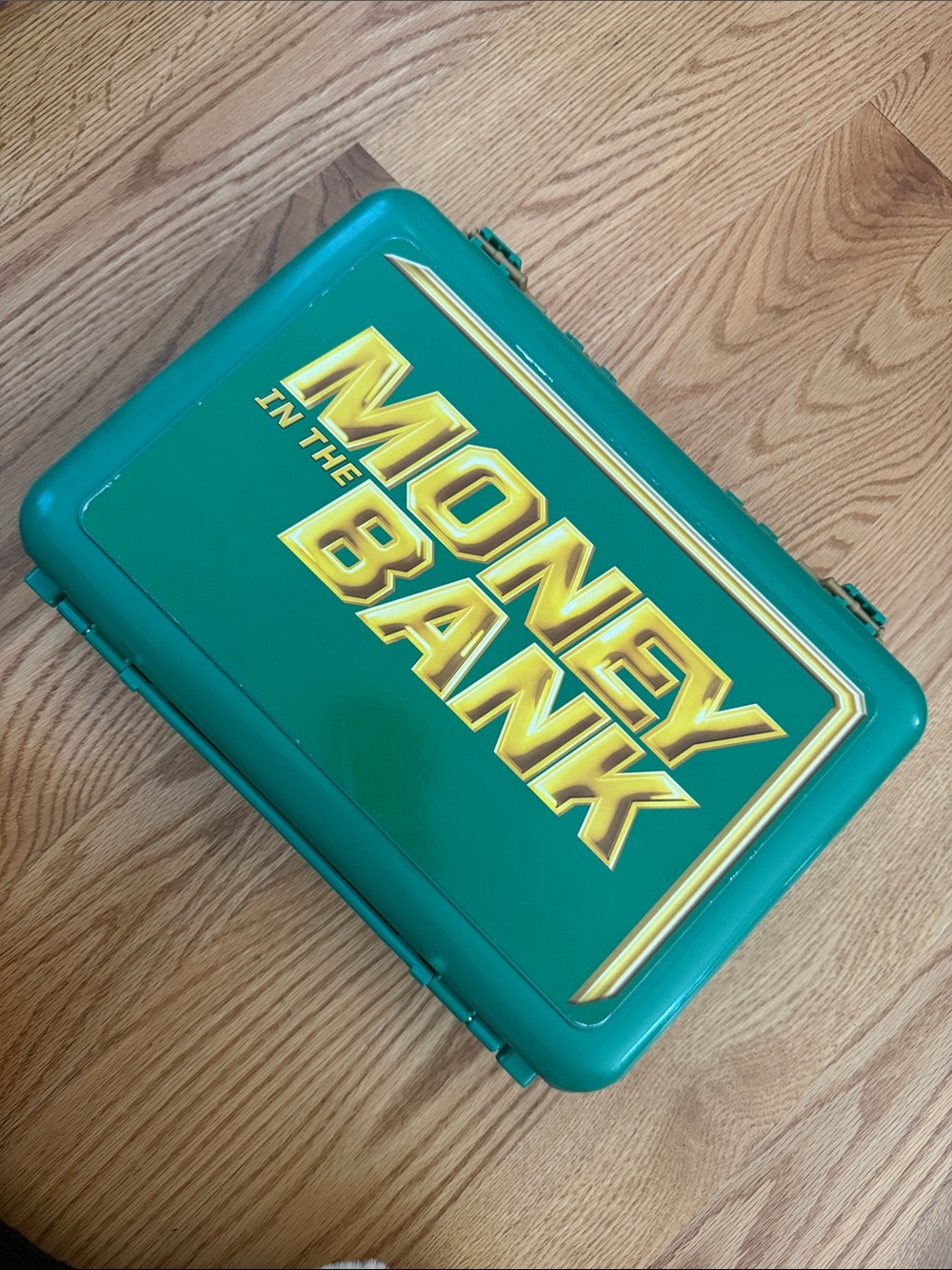 WWE Money in the Bank Green Hard Case Brief with Gold Lettering